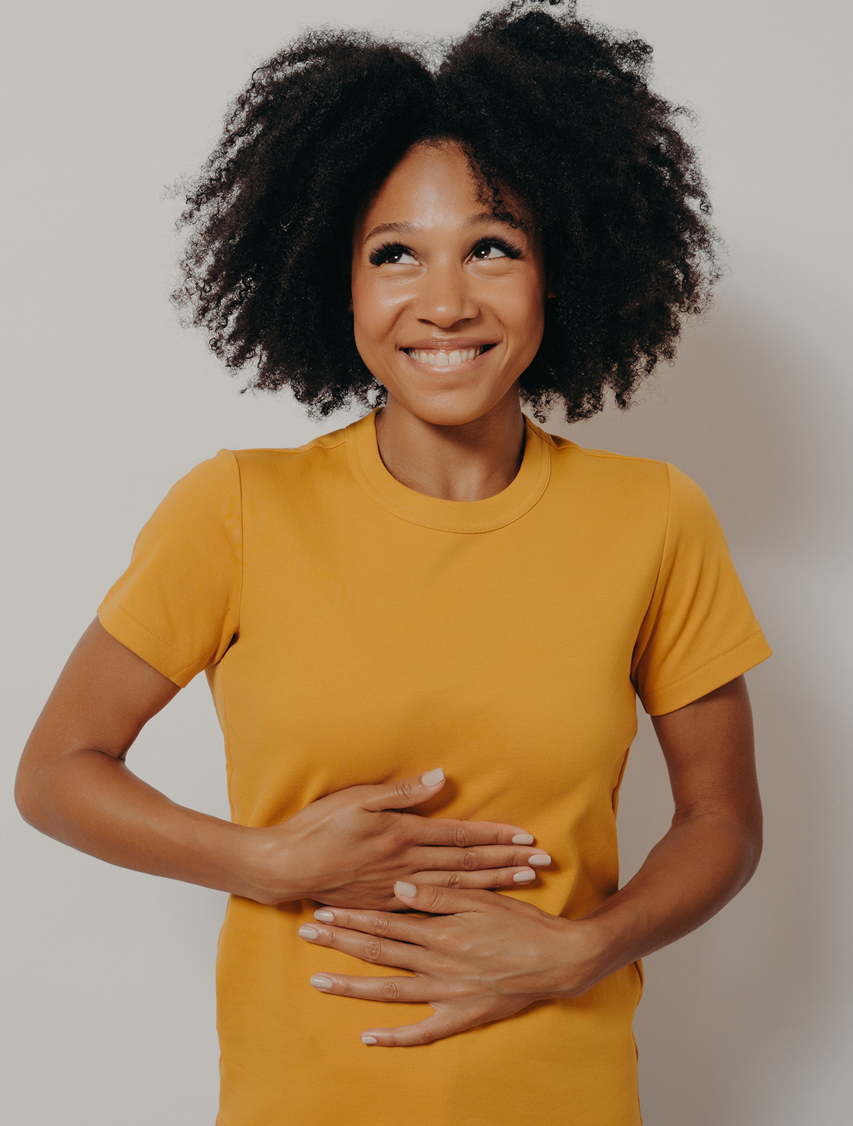 woman holding her gut